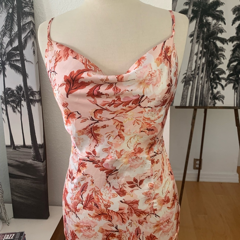 Tsher long slip dress with adjustable straps, zippered back and slit in back.
